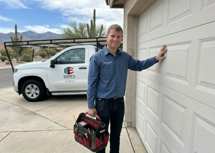 Eddie inspecting a residential garage door in Green Valley, Arizona